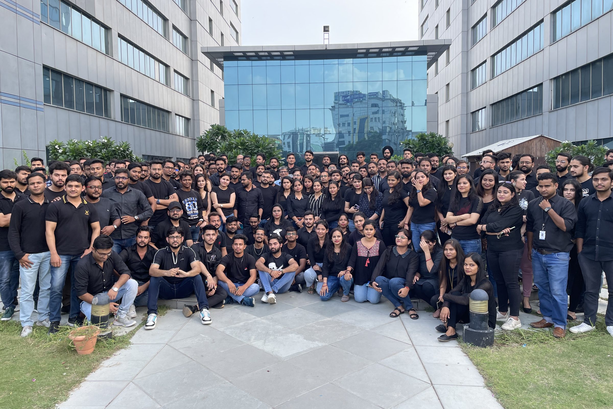 The RNF Technologies team, photographed together outside the office